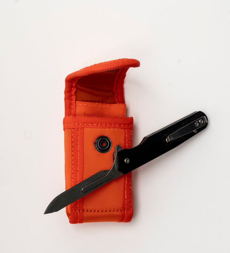 Couteau pliant a lame interchangeable.